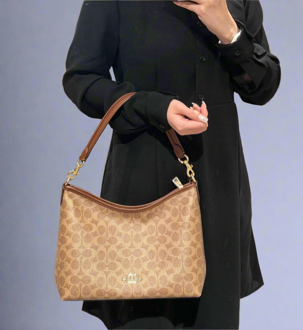 COACH MEDIUM LAUREL SIGNATURE COATED CANVAS