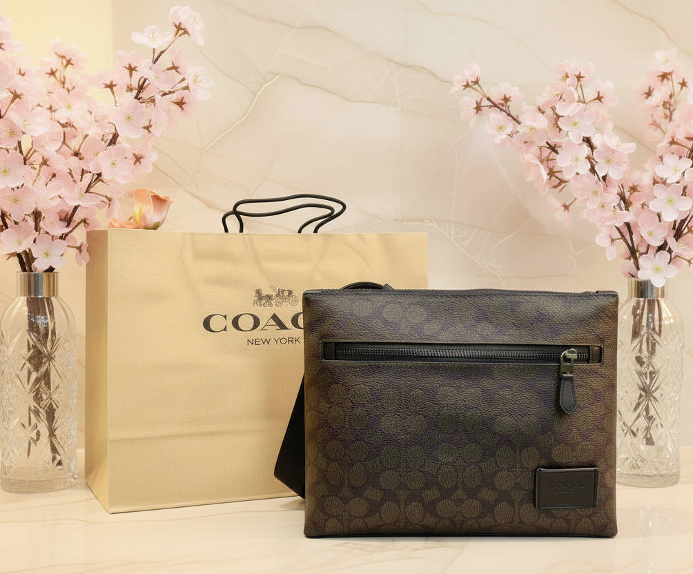 COACH CARRIER CROSSBODY BAG IN SIGNATURE CANVAS - MAHOGANY COLOR