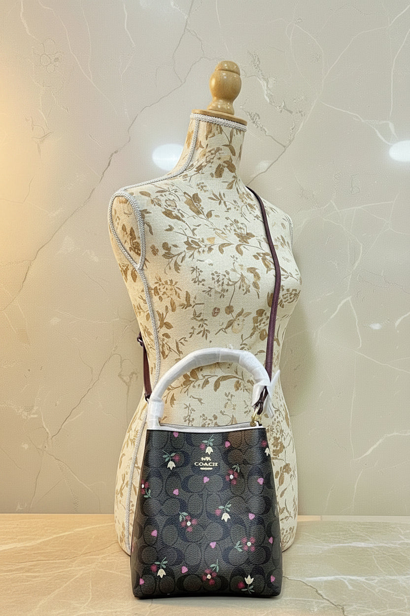 COACH SMALL TOWN BUCKET IN SIGNATURE CANVAS WITH HEART PETAL PRINT