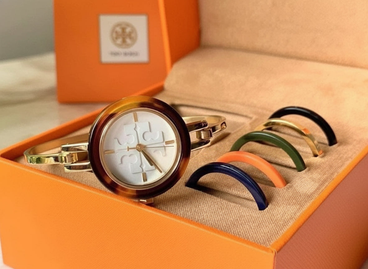 ساعة توري بورش الصغيرة ذات الأزرار القابلة للتبديل