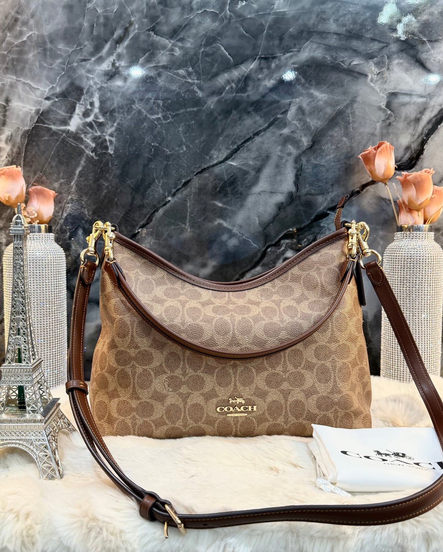 COACH MEDIUM LAUREL SIGNATURE COATED CANVAS