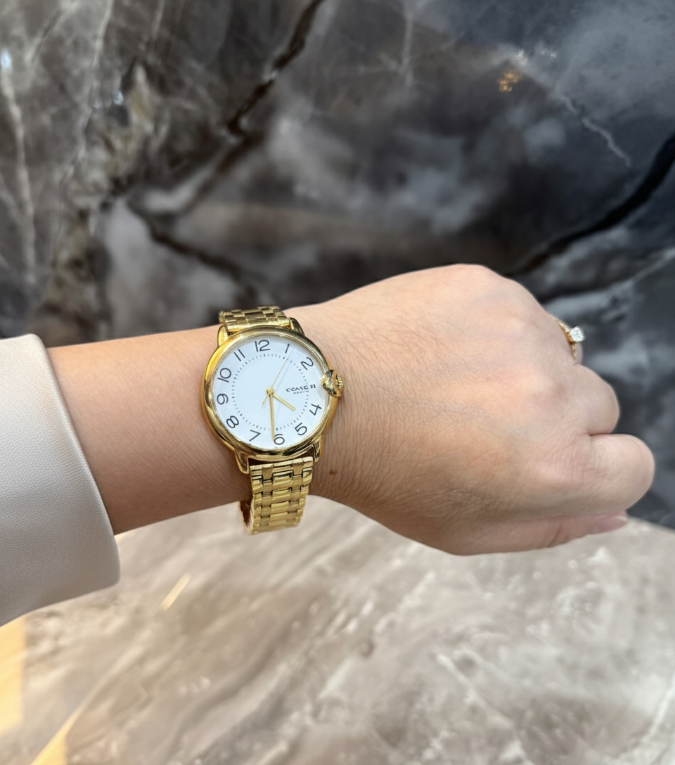 ساعة كوتش إليوت كوارتز من الفولاذ المقاوم للصدأ مطلية بالذهب - مينا صغير