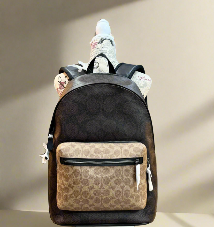 COACH MEN’S WEST BACKPACK IN BLOCKED SIGNATURE CANVAS