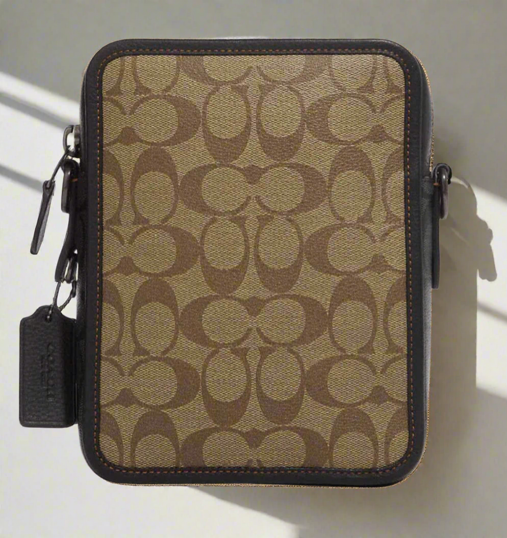 حقيبة كروسبودي من كوتش سوليفان، لون بني/أسود