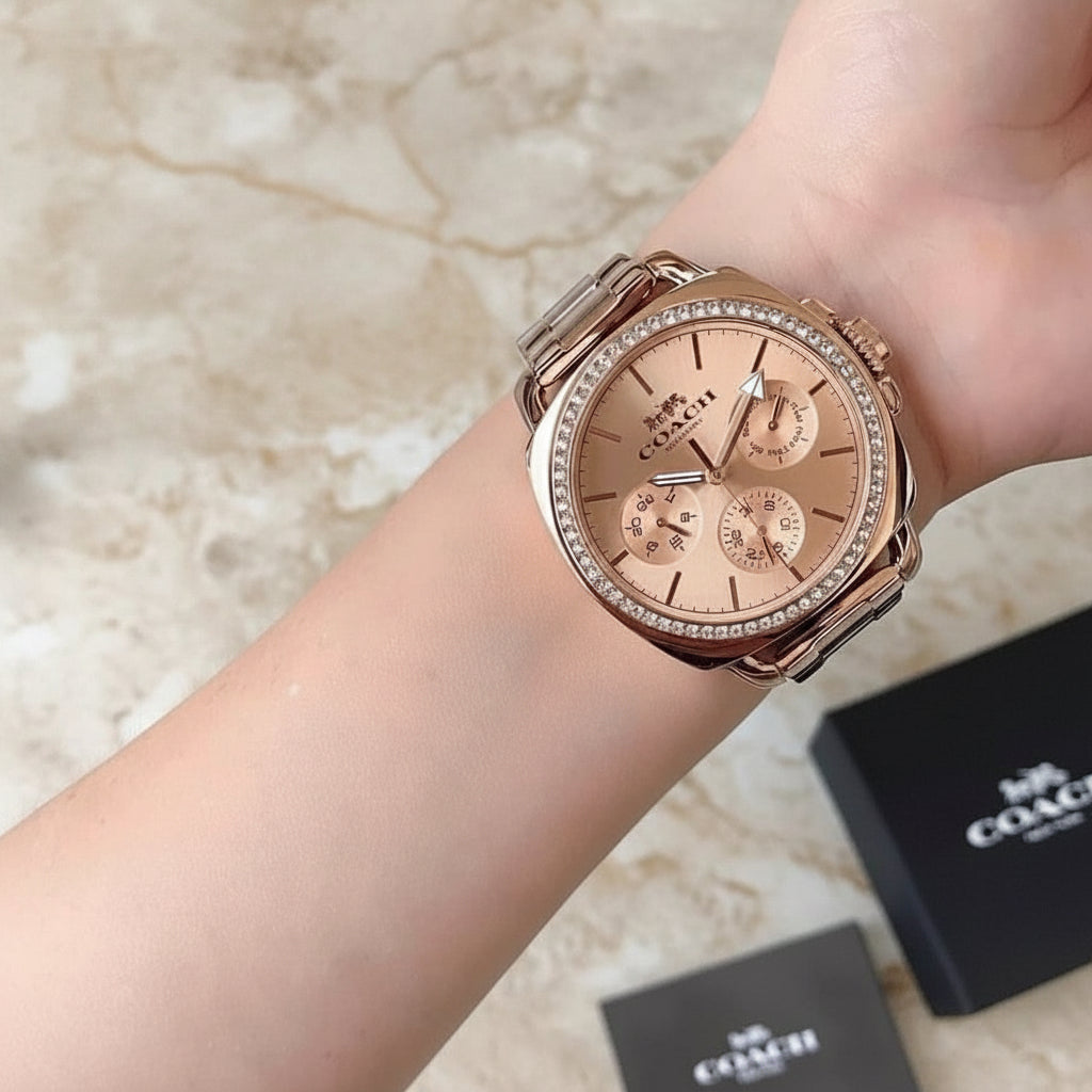 ساعة كوتش ذات وجه كبير - مطلية بالذهب الوردي والفولاذ المقاوم للصدأ