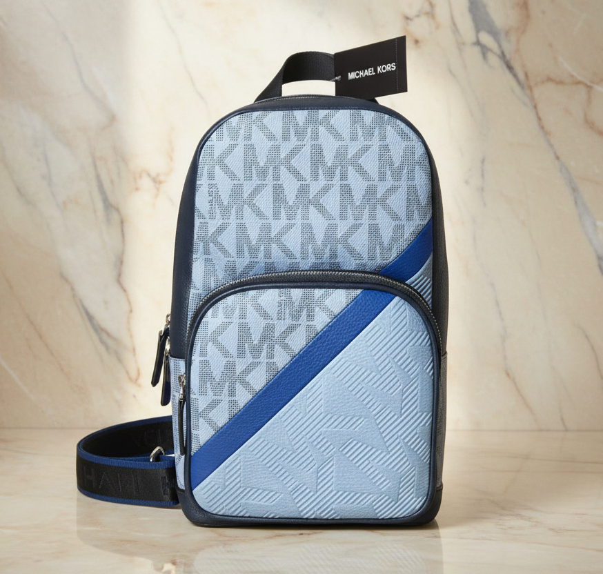MICHAEL KORS COOPER COMMUTER SLINGPACK CHAMBRAY
