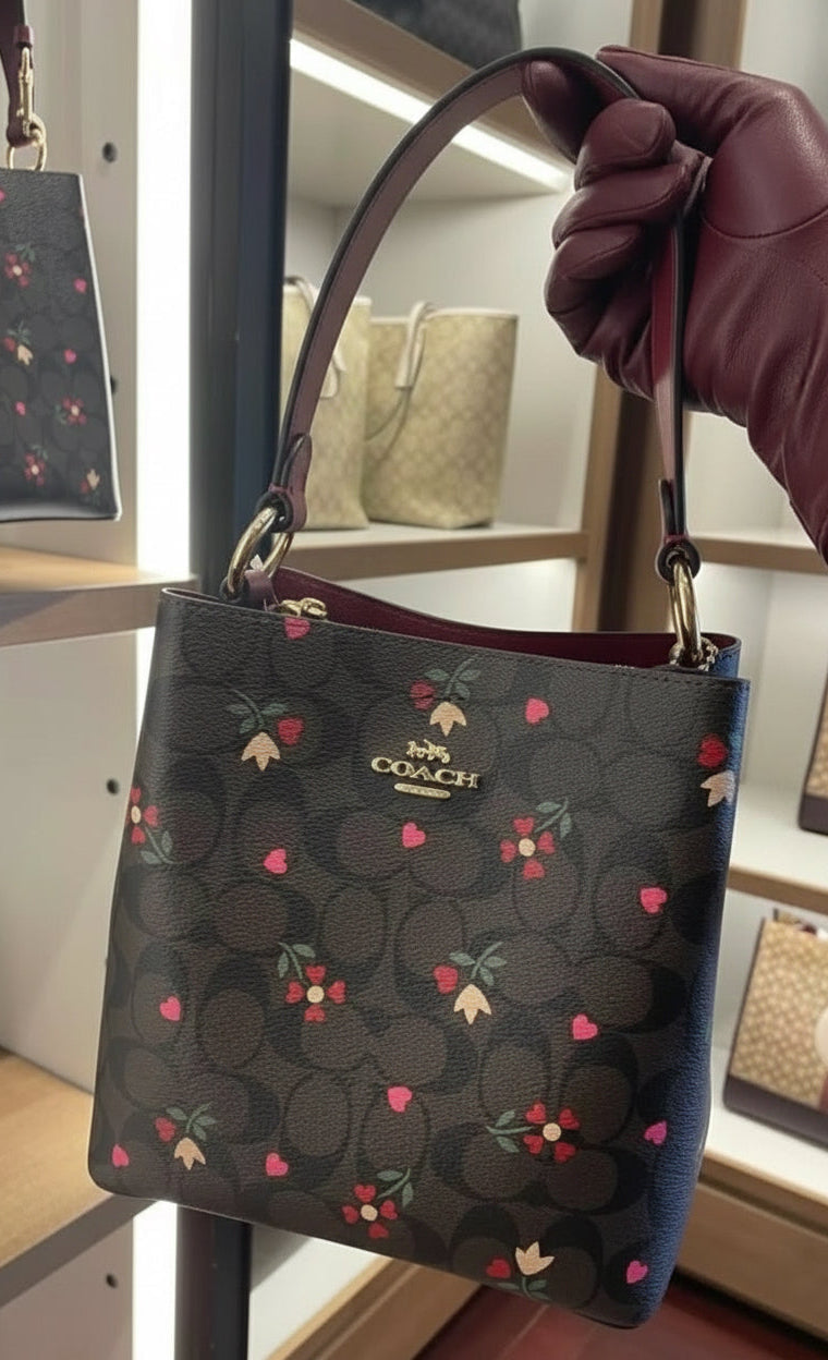 COACH SMALL TOWN BUCKET IN SIGNATURE CANVAS WITH HEART PETAL PRINT