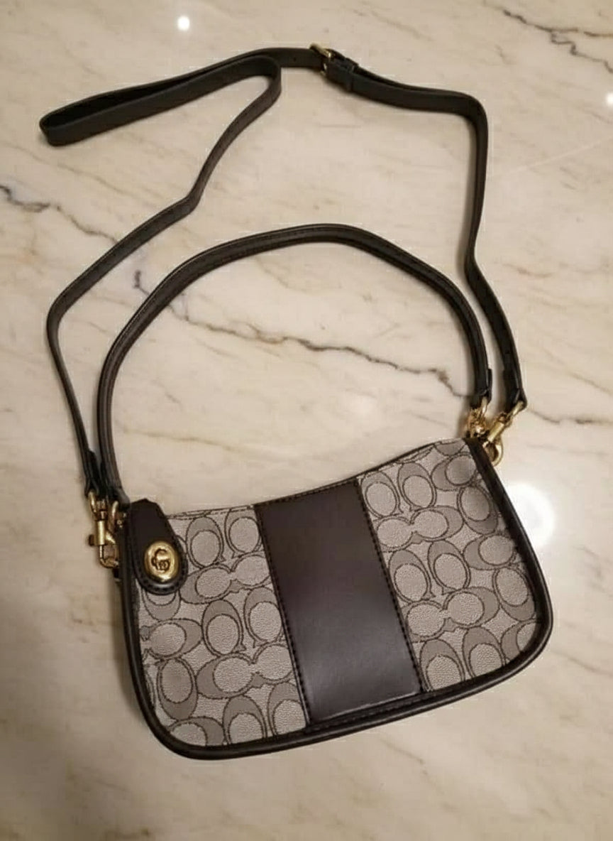 تخفيضات هائلة! ‼️‼️ حقيبة يد من قماش الجاكار من ماركة كوتش - بدون بطاقة السعر