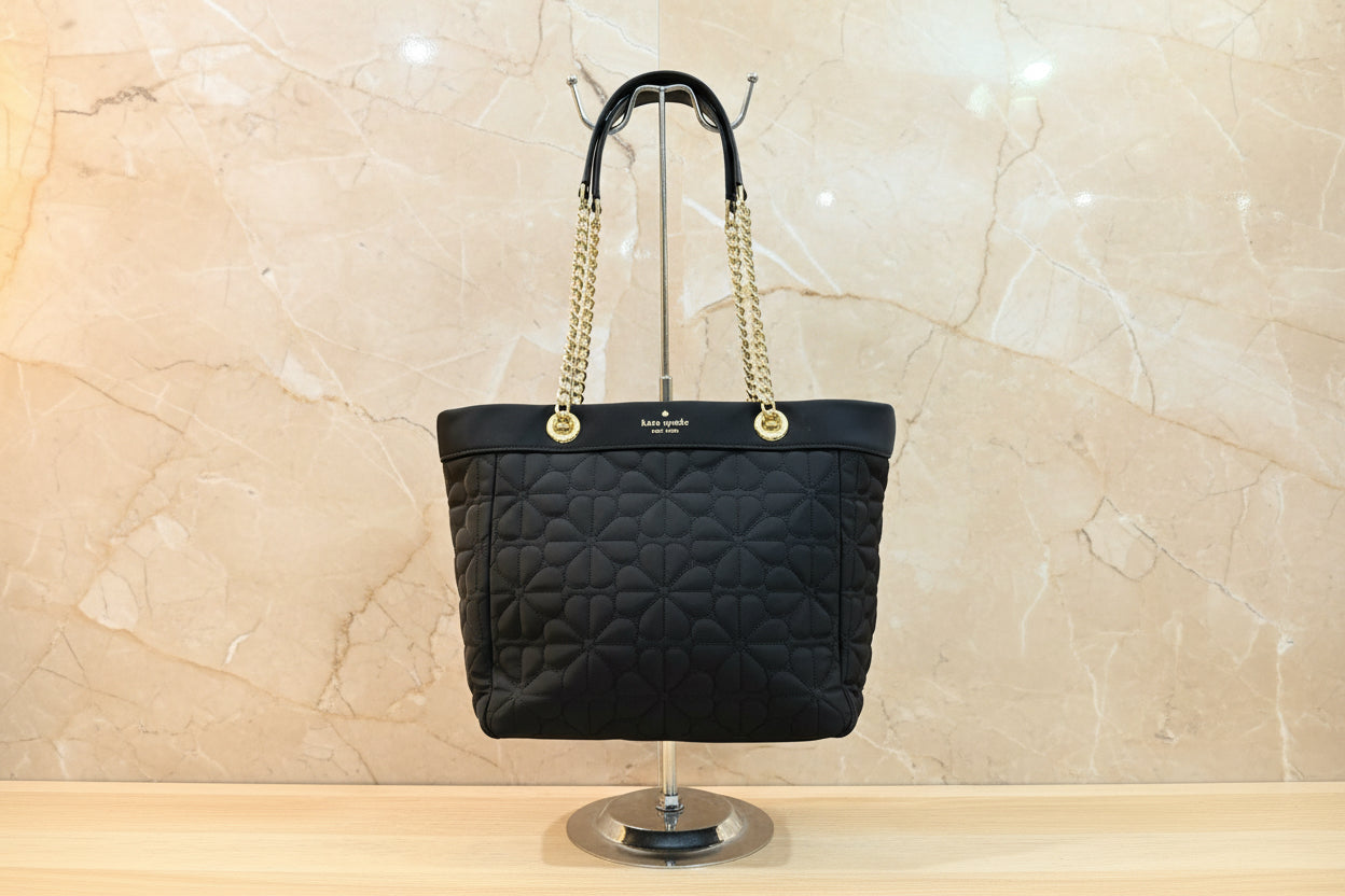 حقيبة كيت سبيد المبطنة والمزينة بالزهور - متوسطة الحجم - سوداء