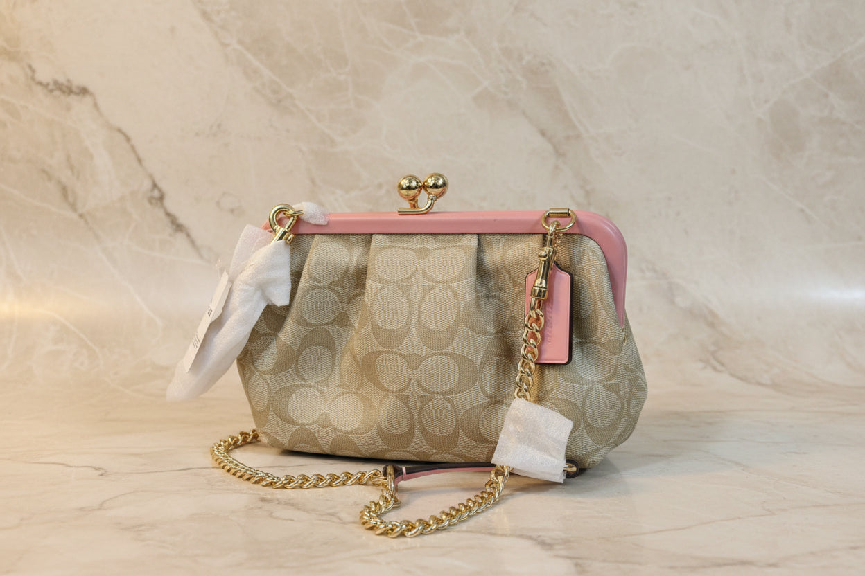 COACH NORA KISSLOCK CLUTCH/CROSSBODY IN SIGNATURE CHALK/IVORY/PINK