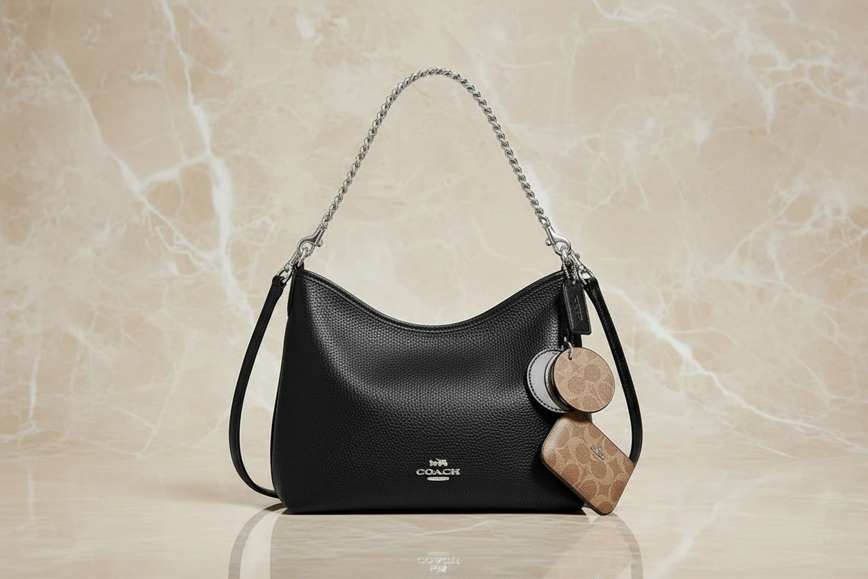 حقيبة كوتش متوسطة الحجم بلون الغار - أسود