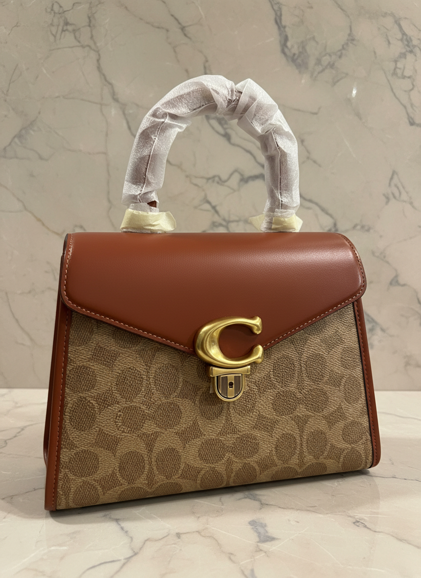 حقيبة كوتش سامي 21 بمقبض علوي - لون بني صدئ مميز