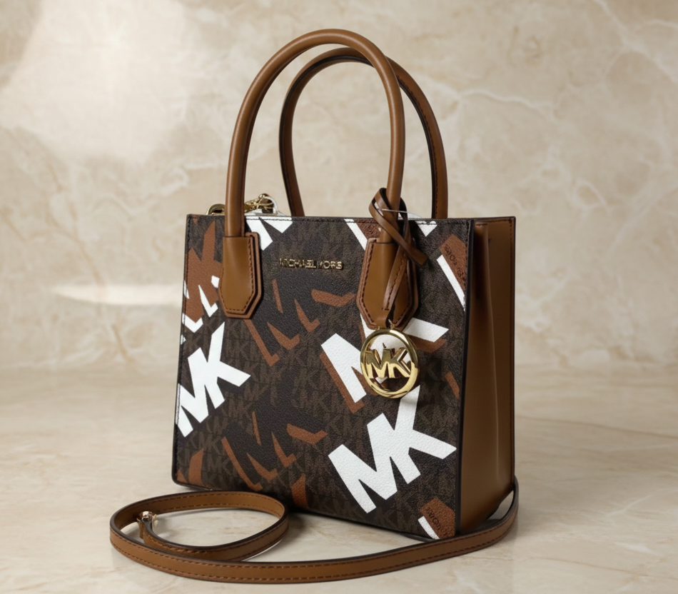 MICHAEL KORS MERCER MEDIUM MESSENGER BAG - LUGGAGE MULTI GRAPHIC LOGO