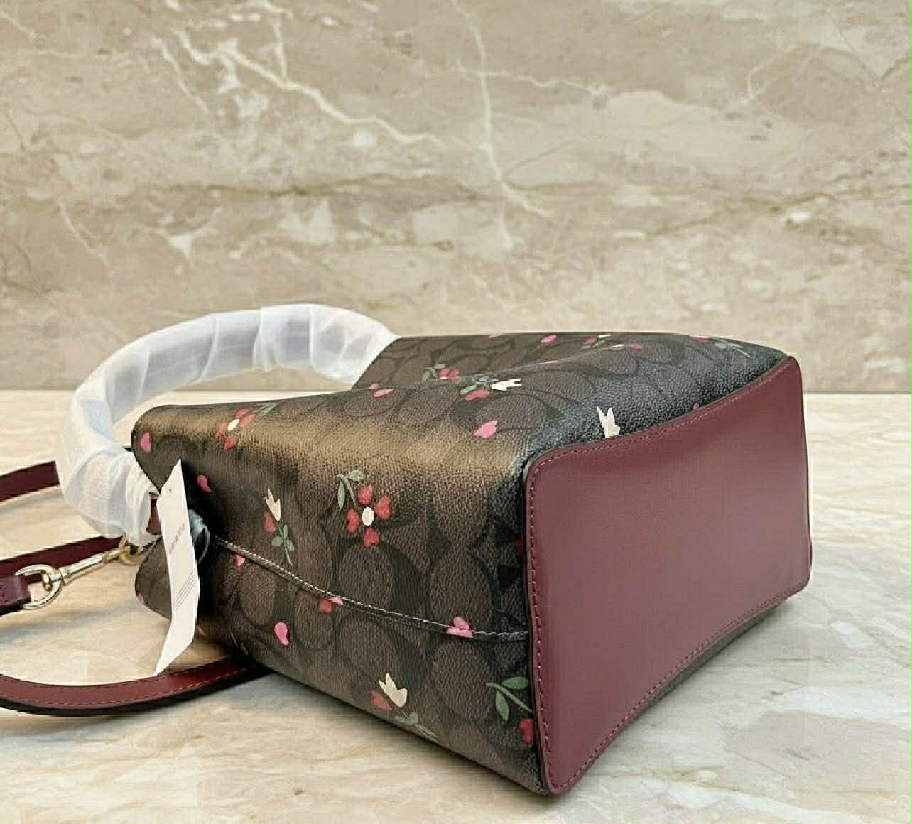 COACH SMALL TOWN BUCKET IN SIGNATURE CANVAS WITH HEART PETAL PRINT