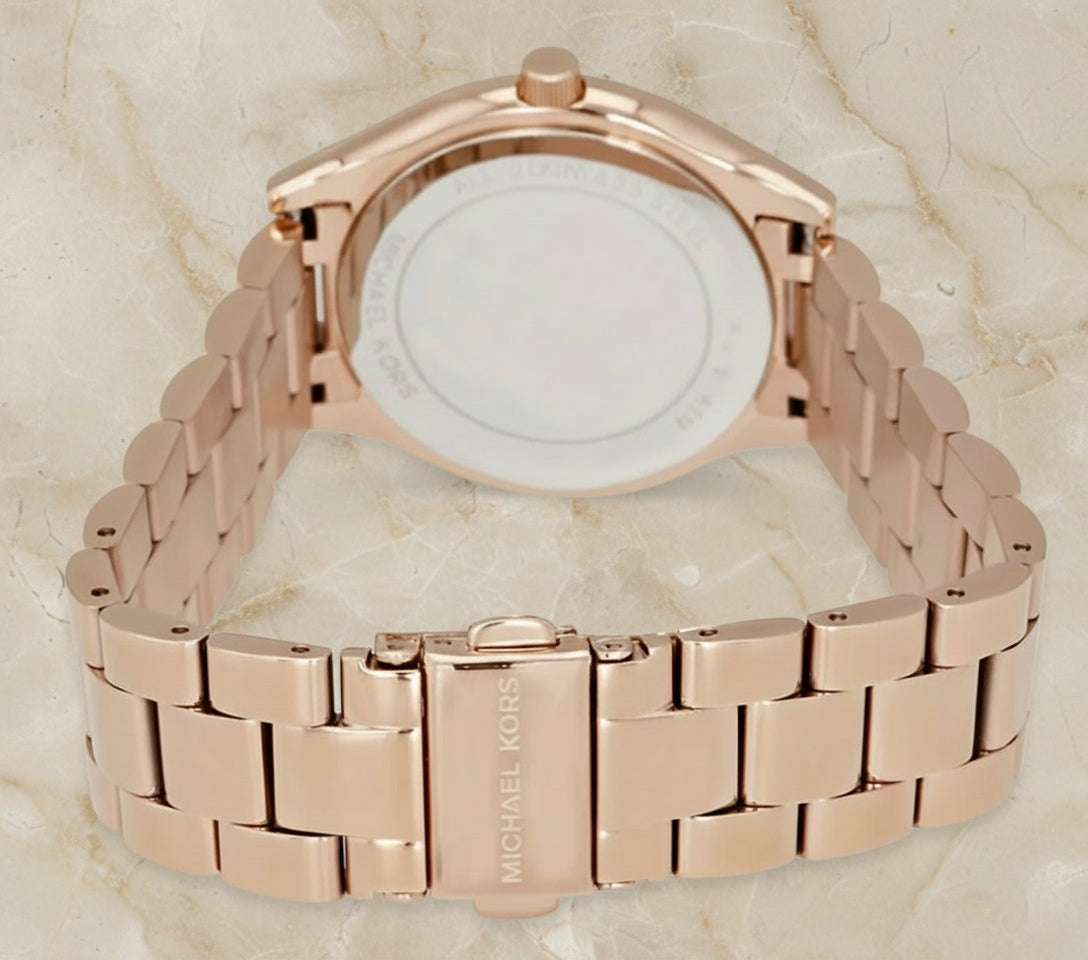 ساعة مايكل كورس ميني سليم رانوي - لون ذهبي وردي - بشعار MK وتصميم مرصع بالكريستال - علبة ساعة مجانية 