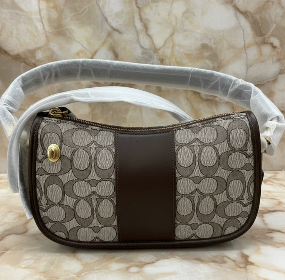 تخفيضات هائلة! ‼️‼️ حقيبة يد من قماش الجاكار من ماركة كوتش - بدون بطاقة السعر