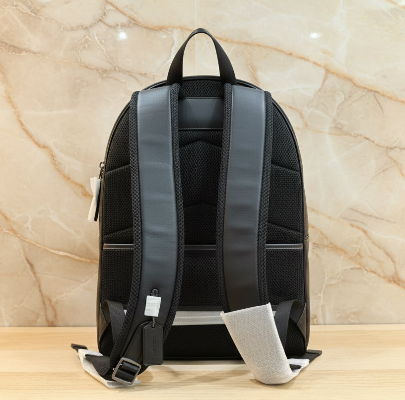 COACH MEN’S WEST BACKPACK IN BLOCKED SIGNATURE CANVAS