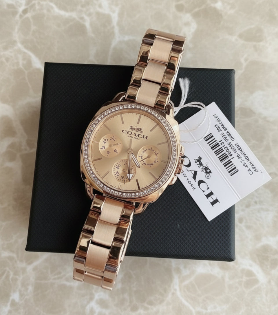 ساعة كوتش ذات وجه كبير - مطلية بالذهب الوردي والفولاذ المقاوم للصدأ