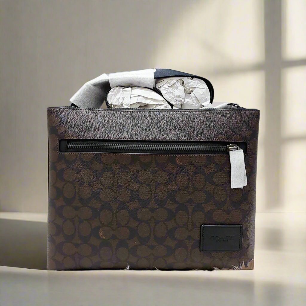 COACH DISCTRICT CROSSBODY BAG IN SIGNATURE CANVAS - MAHOGANY COLOR