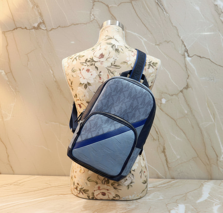 MICHAEL KORS COOPER COMMUTER SLINGPACK CHAMBRAY