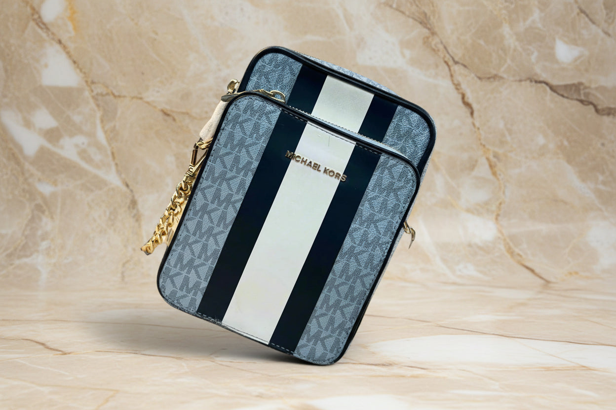 MICHAEL KORS - BELOW SRP WITH FLAWS IN FRONT - SLIGHT MARK LIKE PEN - JET SET TRAVEL LOGO STRIPE CROSSBODY BAG