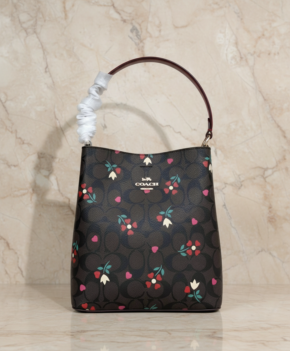 COACH SMALL TOWN BUCKET IN SIGNATURE CANVAS WITH HEART PETAL PRINT