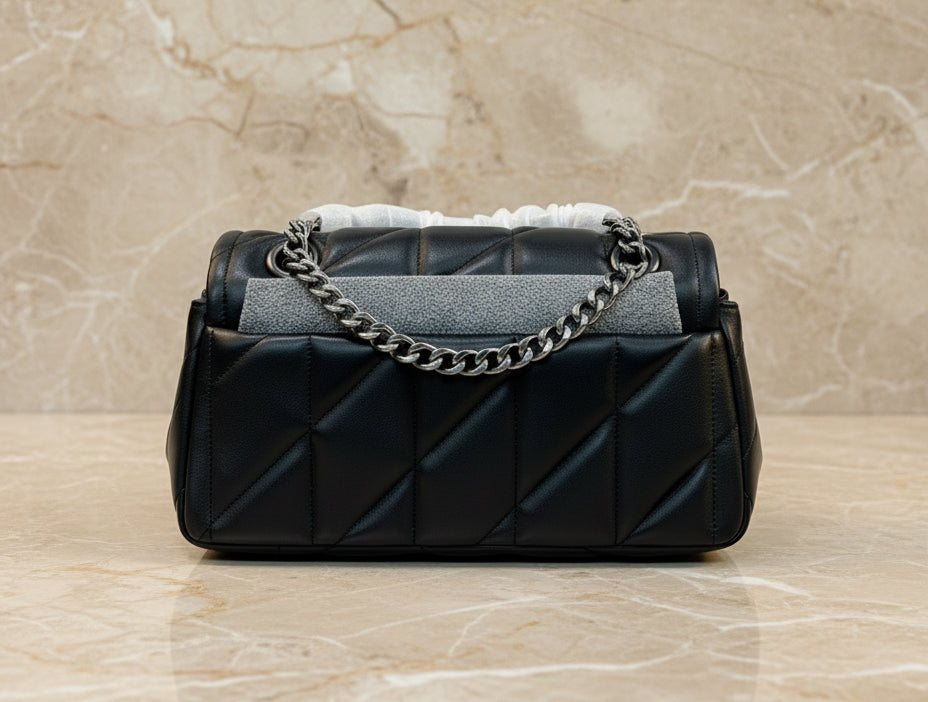 حقيبة كوتش مبطنة بنقشة تابي 20 - جلد نابا - أسود