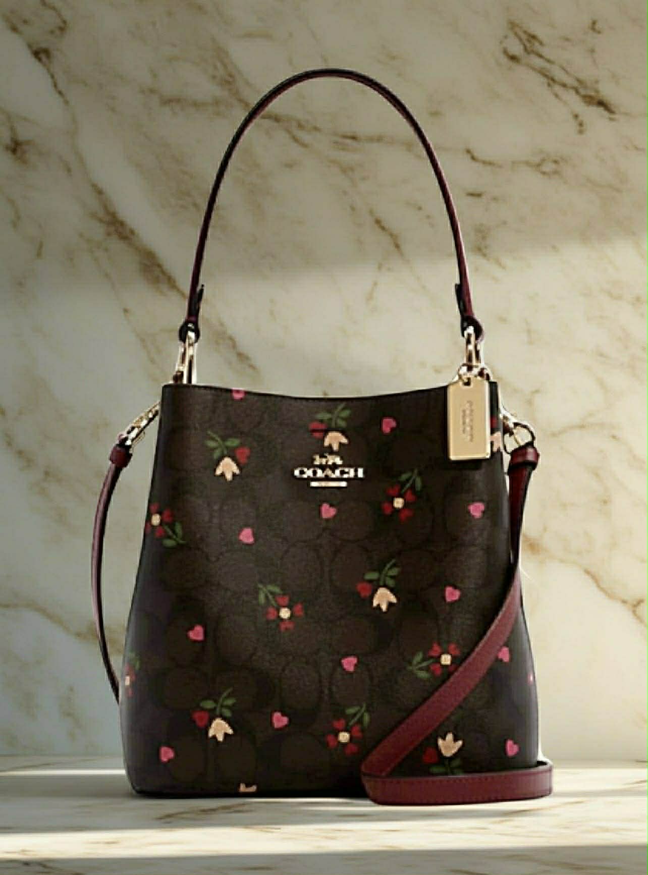 COACH SMALL TOWN BUCKET IN SIGNATURE CANVAS WITH HEART PETAL PRINT