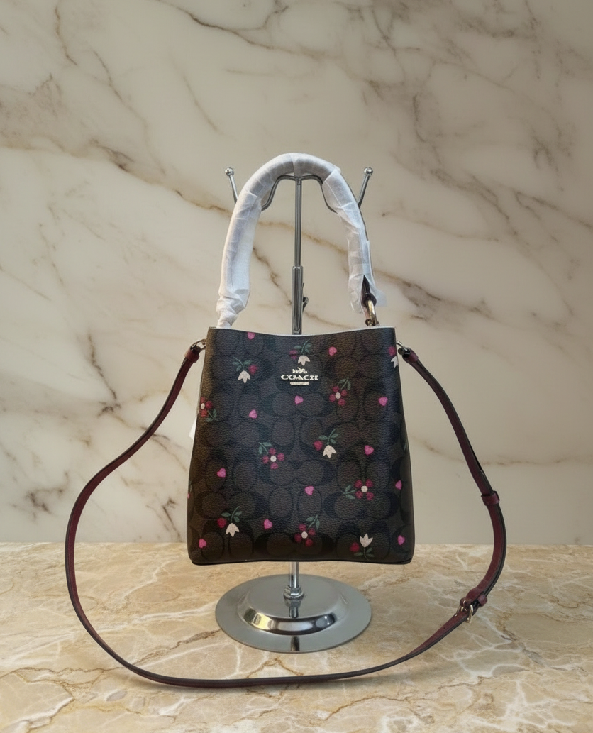 COACH SMALL TOWN BUCKET IN SIGNATURE CANVAS WITH HEART PETAL PRINT