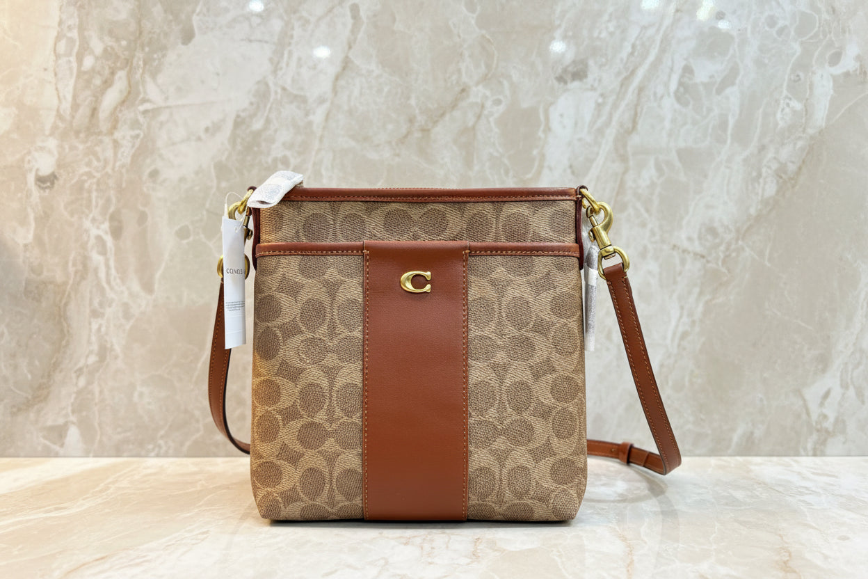 حقيبة كروسبودي من كوتش كيت