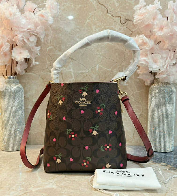 COACH SMALL TOWN BUCKET IN SIGNATURE CANVAS WITH HEART PETAL PRINT