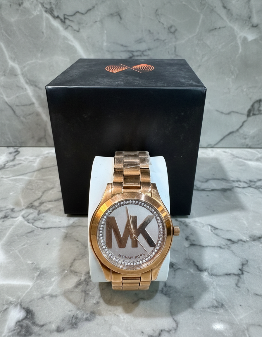 ساعة مايكل كورس ميني سليم رانوي - لون ذهبي وردي - بشعار MK وتصميم مرصع بالكريستال - علبة ساعة مجانية 