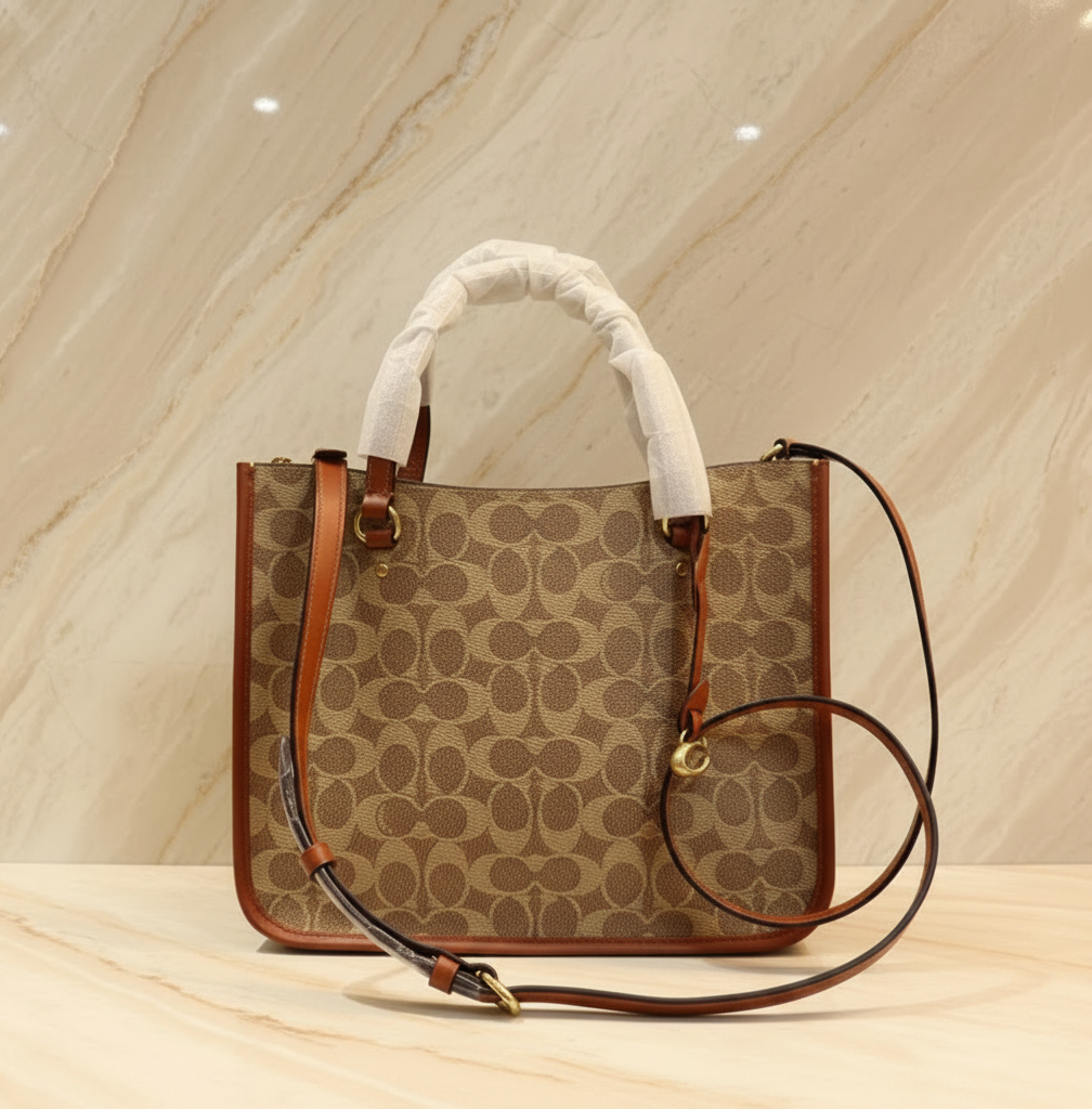 COACH TYLER CARRYALL 28 IN SIGNATURE CANVAS