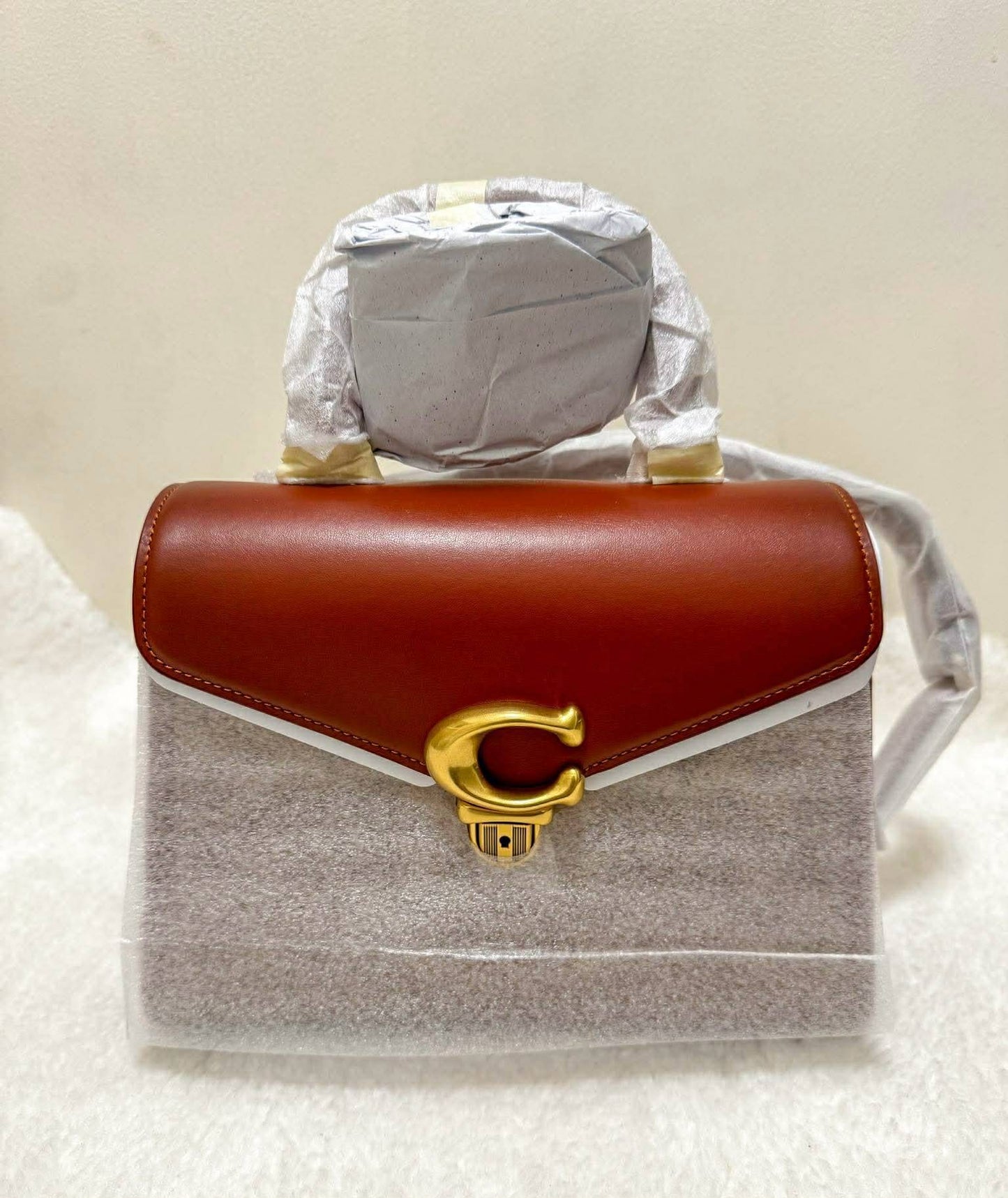 حقيبة كوتش سامي 21 بمقبض علوي - لون بني صدئ مميز