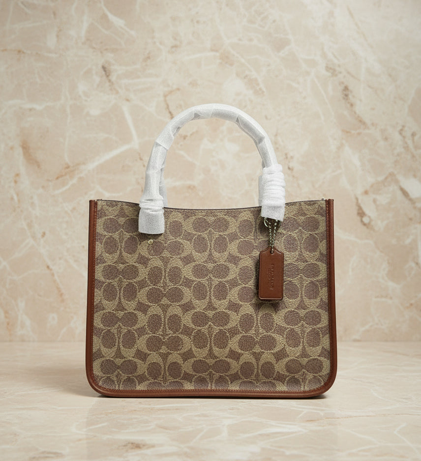 COACH TYLER CARRYALL 28 IN SIGNATURE CANVAS