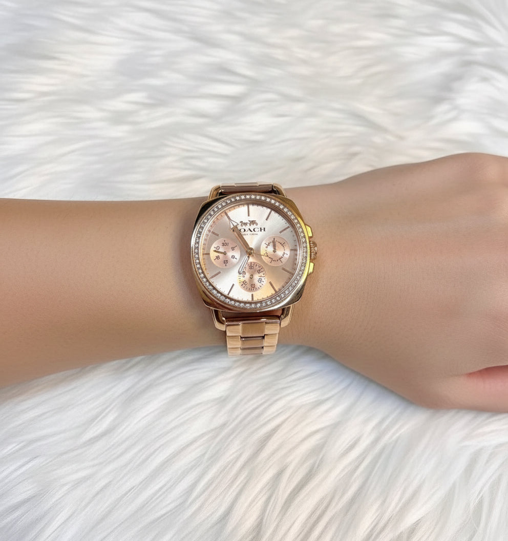 ساعة كوتش ذات وجه كبير - مطلية بالذهب الوردي والفولاذ المقاوم للصدأ