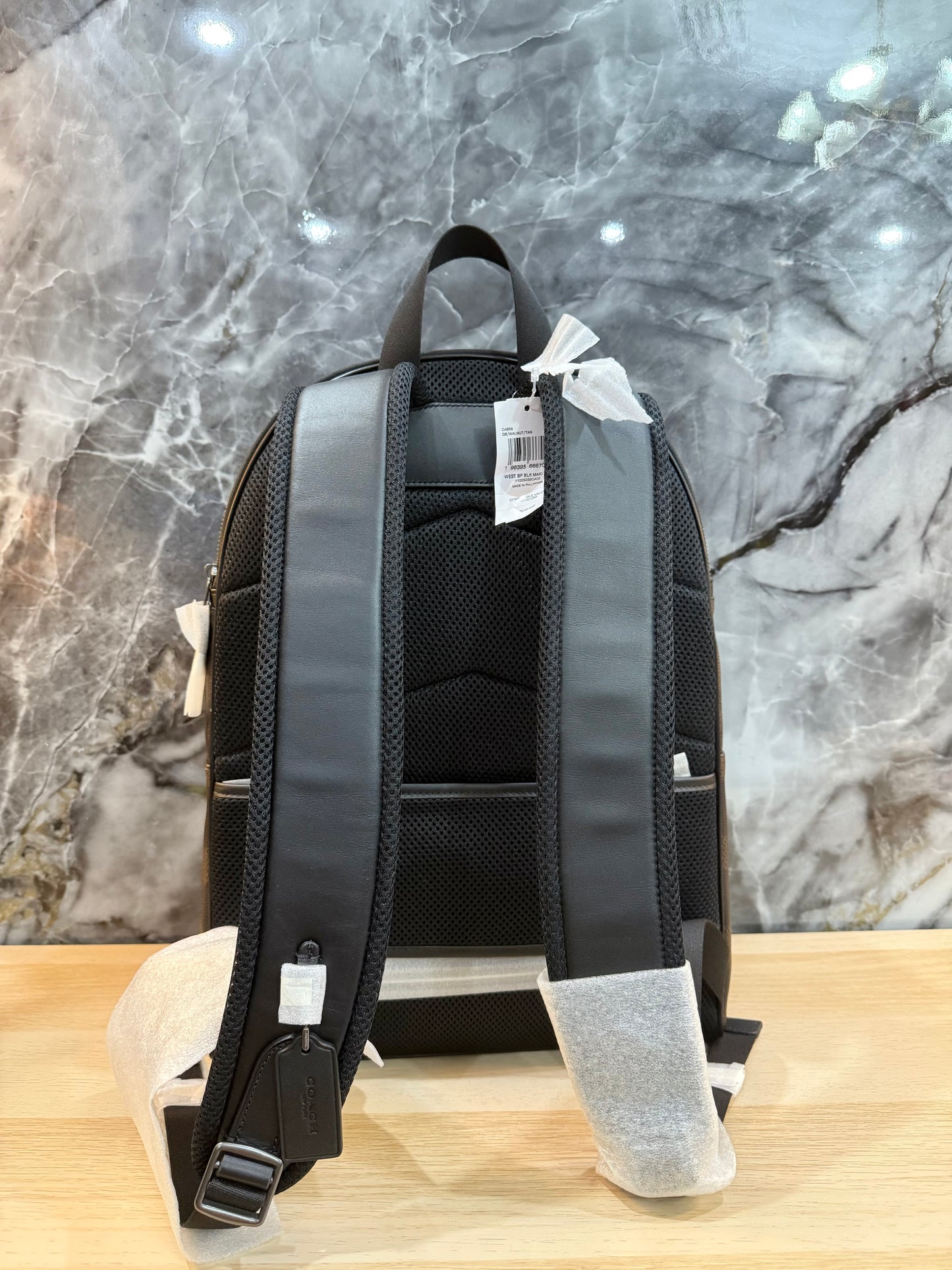 COACH MEN’S WEST BACKPACK IN BLOCKED SIGNATURE CANVAS