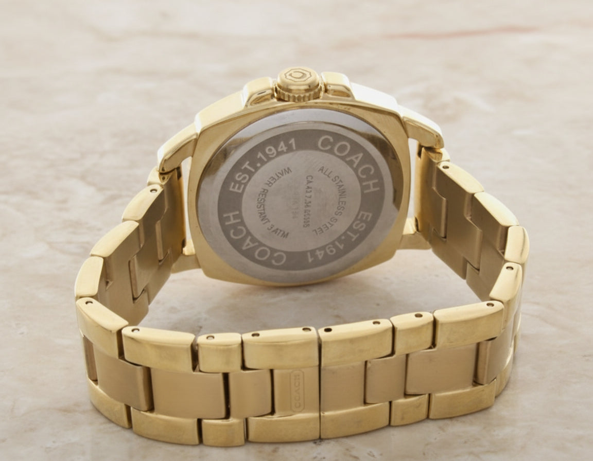 ساعة كوتش بوي فريند ذهبية من الفولاذ المقاوم للصدأ