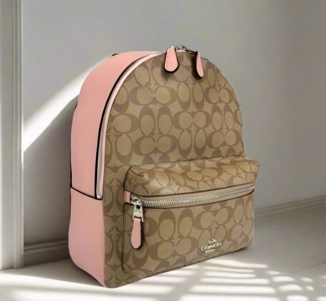 حقيبة ظهر متوسطة الحجم من كوتش تشارلي - لون بني/وردي مميز