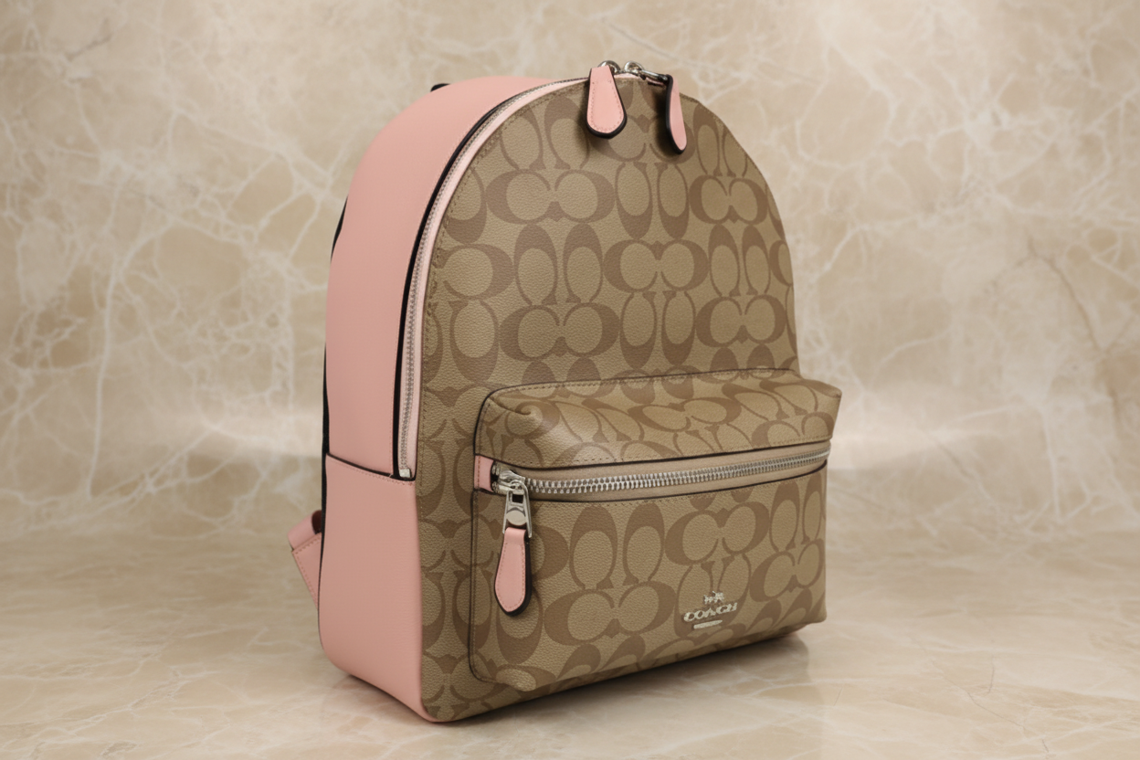 حقيبة ظهر متوسطة الحجم من كوتش تشارلي - لون بني/وردي مميز