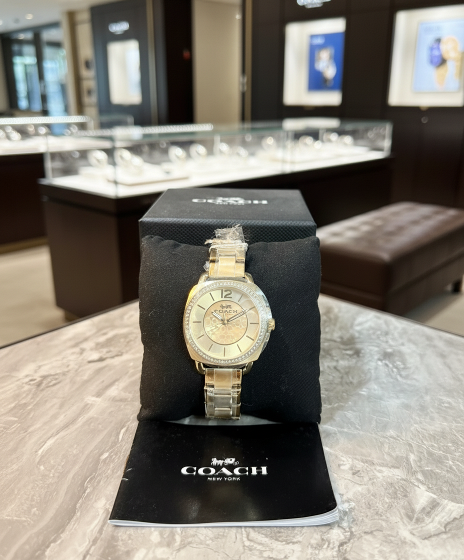 ساعة كوتش بوي فريند ذهبية من الفولاذ المقاوم للصدأ