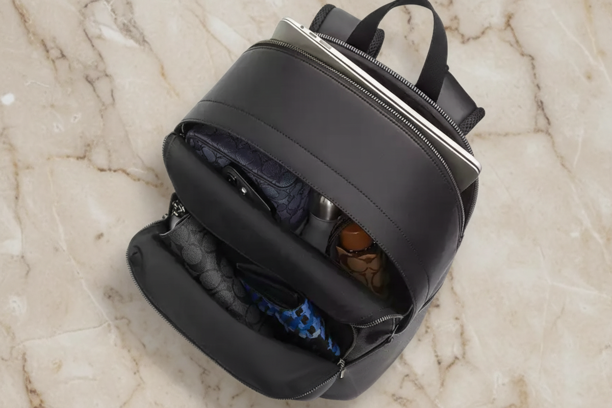 COACH MEN’S WEST BACKPACK IN BLOCKED SIGNATURE CANVAS