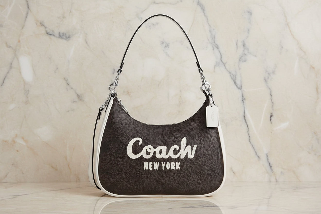 حقيبة كتف/حقيبة كروس بودي من كوتش سكريبت تيري هوبو - متوسطة الحجم