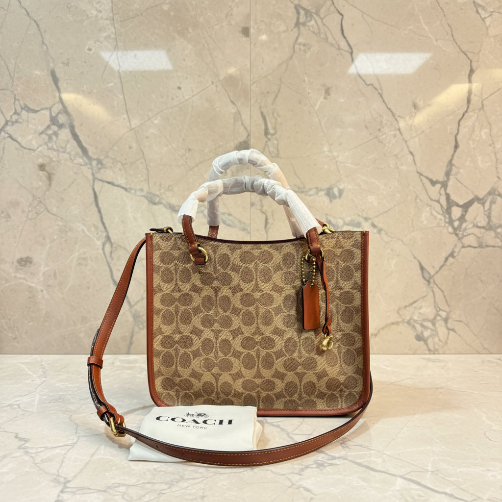 COACH TYLER CARRYALL 28 IN SIGNATURE CANVAS