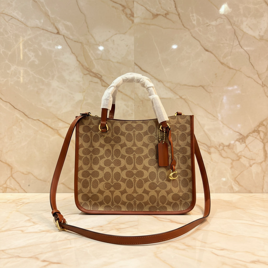 COACH TYLER CARRYALL 28 IN SIGNATURE CANVAS