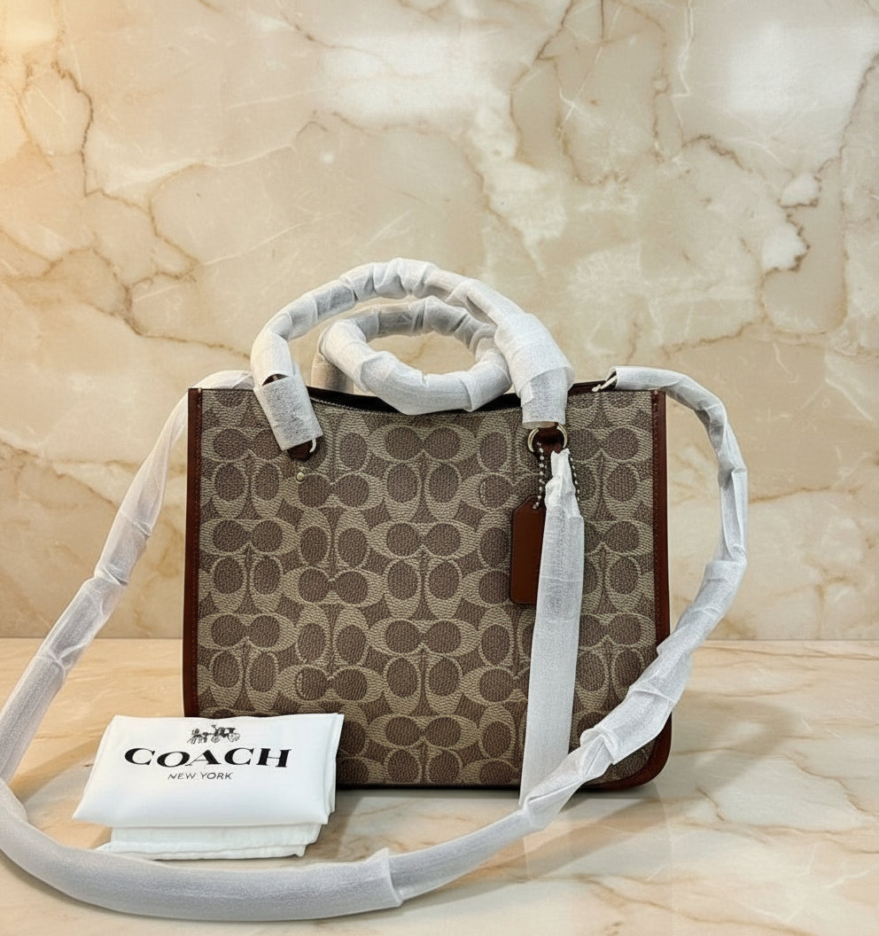 COACH TYLER CARRYALL 28 IN SIGNATURE CANVAS