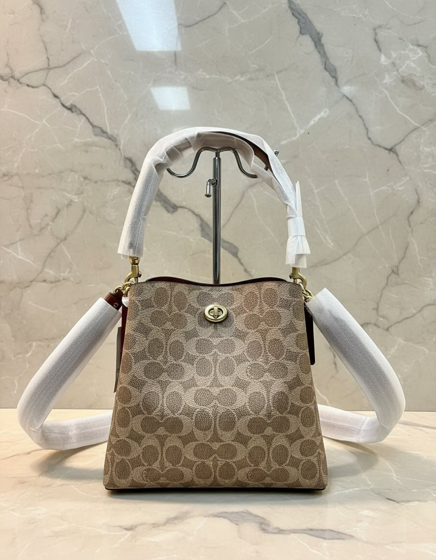 حقيبة دلو من كوتش ويلو بلون بني صدئ مميز