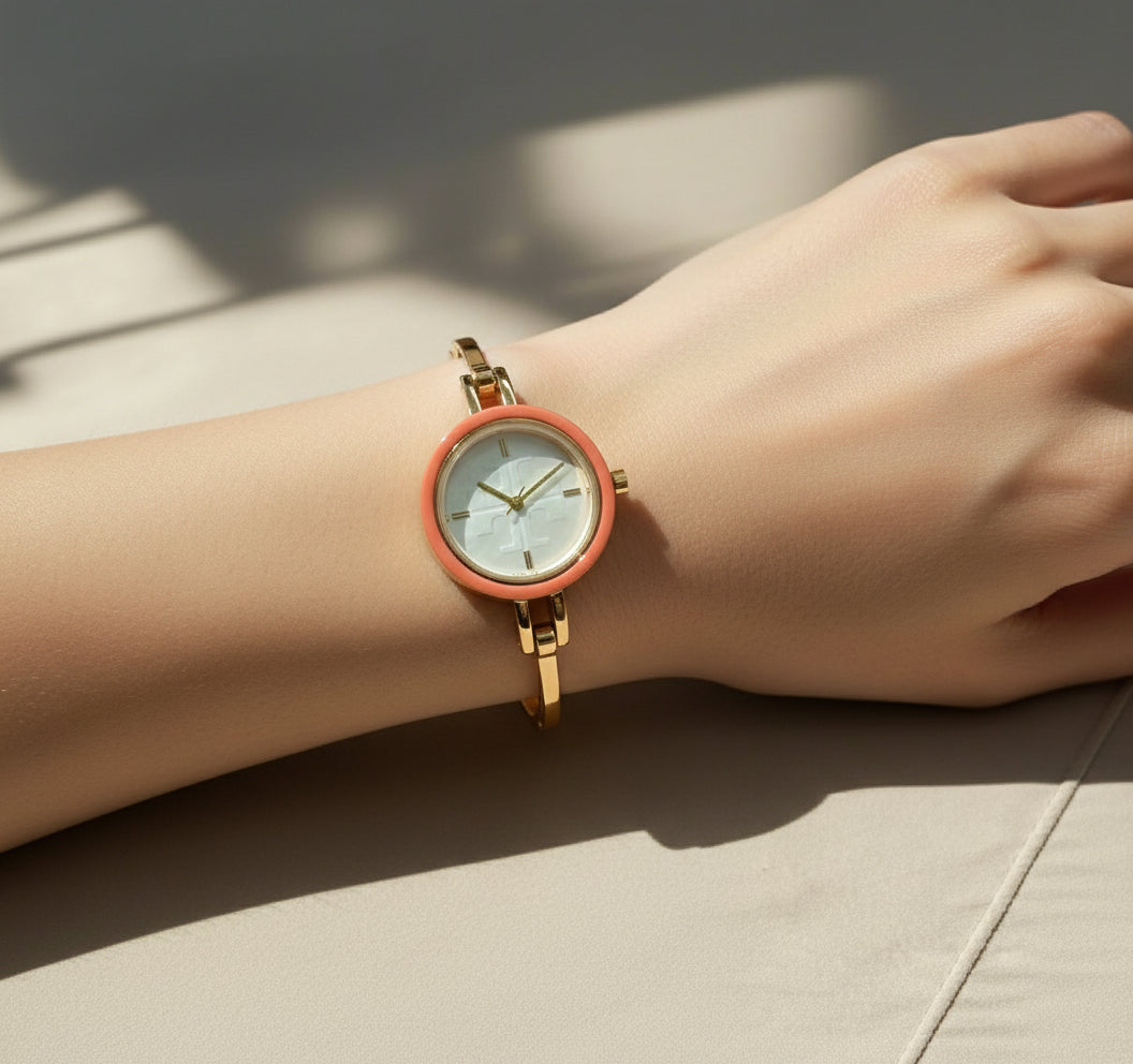 ساعة توري بورش الصغيرة ذات الأزرار القابلة للتبديل