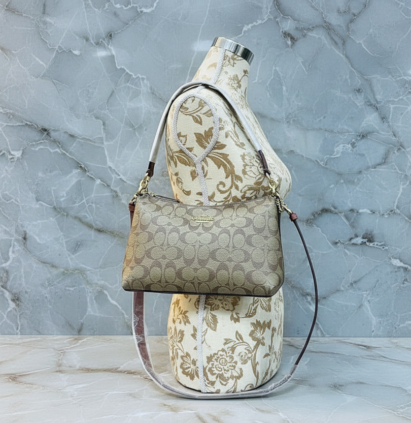 طقم كوتش لويس: حقيبة كتف/حقيبة كروس بودي ومحفظة معصم بسحاب من قماش الكانفاس المميز ببطانة من الطين المعدني