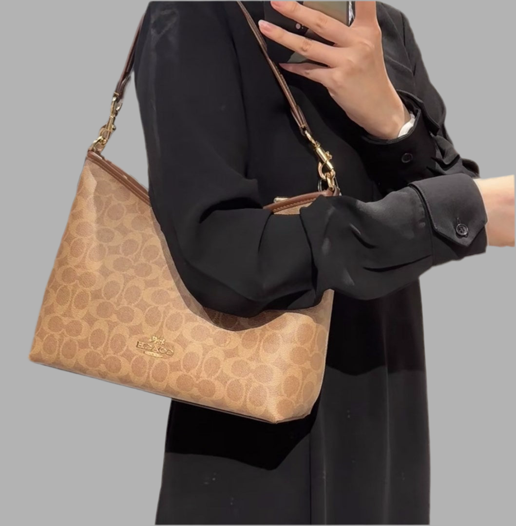 COACH MEDIUM LAUREL SIGNATURE COATED CANVAS